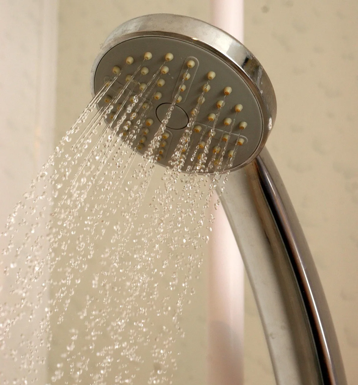 Running shower head in a Nottingham bathroom